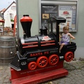 Greta on the train at the toy museum
